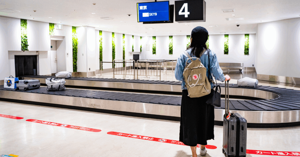 girl with suitcase at airport