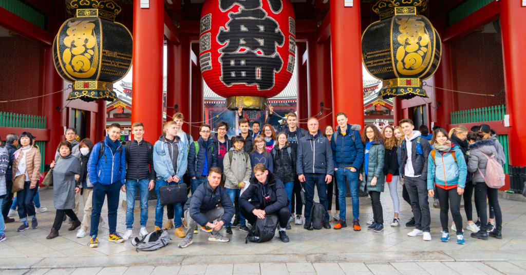 group in front of temple gate